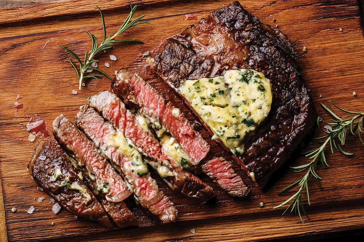 Grilled Ribeye Steak with Garlic Herb Butter - TheWineBuzz